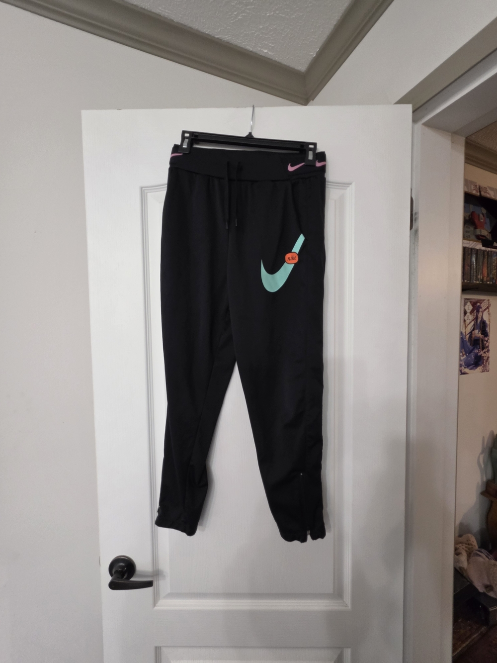 Nike Black Joggers with Teal and Pink Swoosh Accents